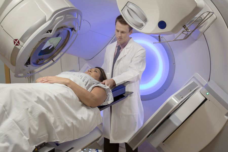 Woman receiving radiation therapy for cancer